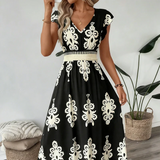 Candela – Vestido maxi barroco com decote em V